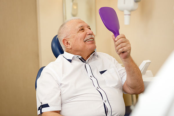 Improving Your Oral Health While Adjusting To New Dentures